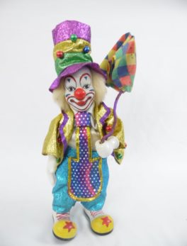 Clown automate musical en porcelaine