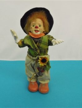 Clown automate musical en porcelaine