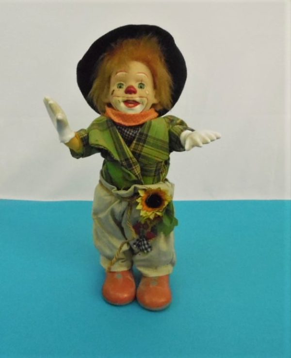 Clown automate musical en porcelaine